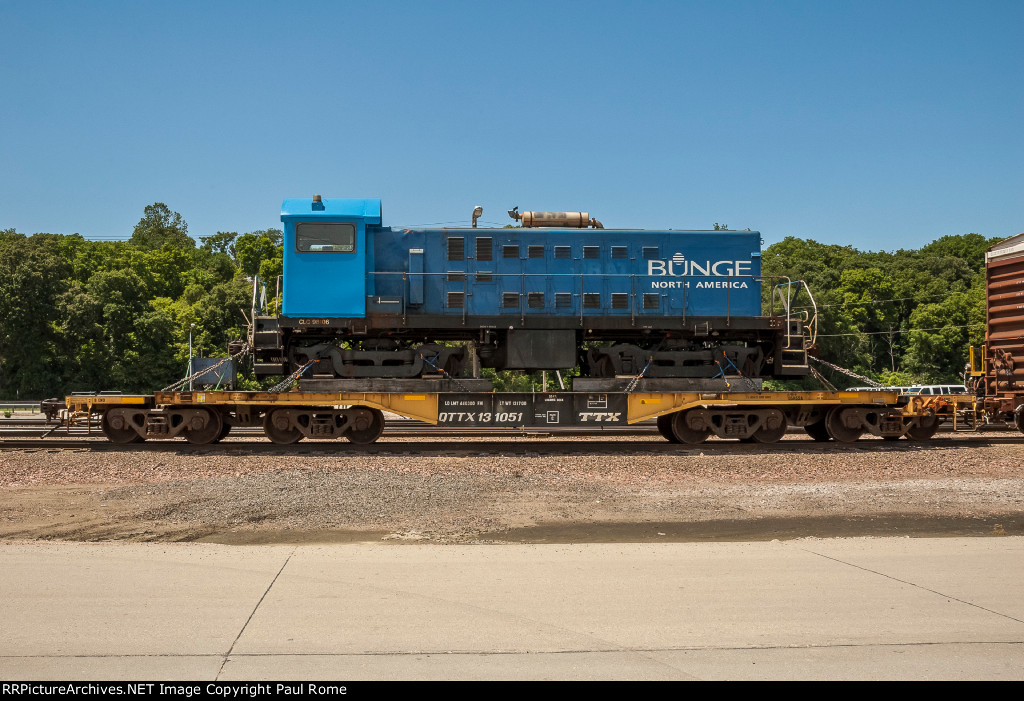 CLC 98106, ALCO S4, was working as BNGX 1039, ex SAL 1484 at the Bunge Processing plant in Council Bluffs Iowa, seen here loaded for delivery on QTTX 131051 8-axle HD Flat Car at BNSFs Gibson Yard